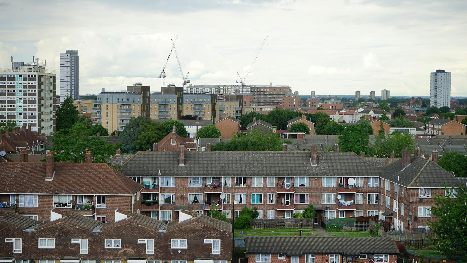 Aerial view of residential buildings in Greater London showcasing urban housing.